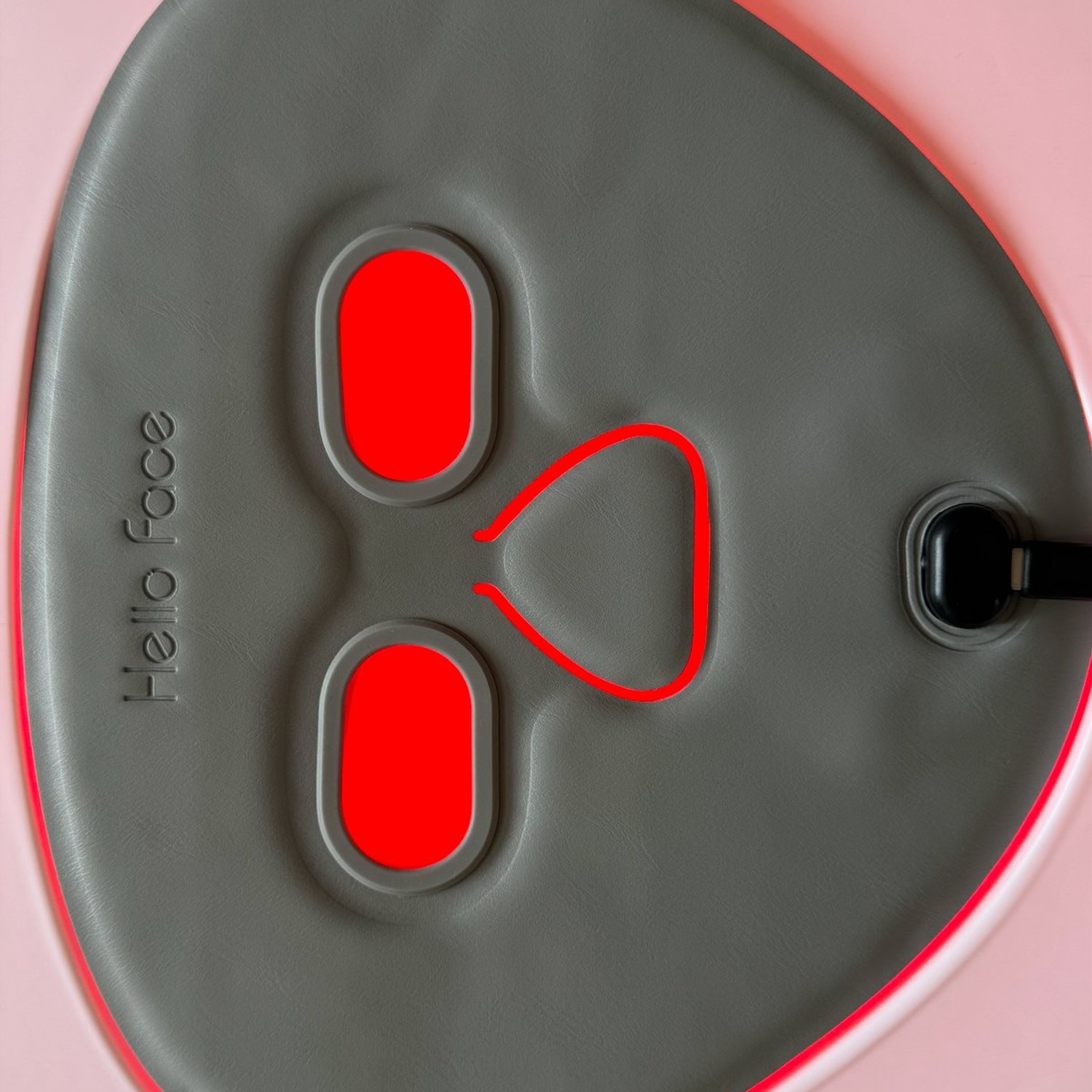 ZURAL HF LED Face Mask — LEDs on, red glow through cutouts